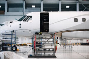 Business jet in a hangar for maintenance