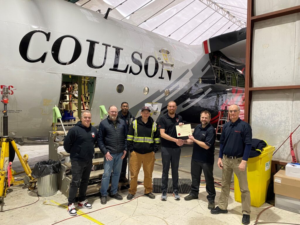 Transport Canada presents Britt Coulson and the Coulson Aviation team with their ATO approval © Coulson Aviation