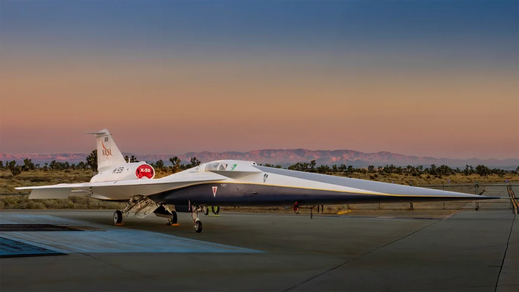 NASA’s X-59 quiet supersonic research aircraft sits on the apron outside Lockheed Martin’s Skunk Works facility at dawn in Palmdale, California