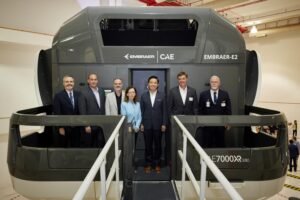 Representatives of Embraer and CAE at the unveiling of the new CAE 7000XR Series FFS in Singapore © Embraer