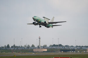 A Boeing flight-test crew conducted functional checks during the aircraft’s first flight from Birmingham Airport
