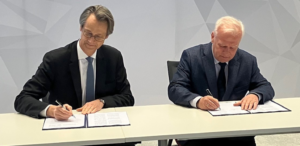 Safran CEO Olivier Andriès (l) and Krzysztof Trofiniak, President of PGZ