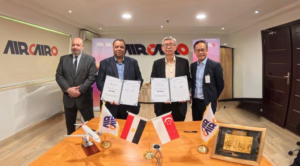 Representatives from ST Engineering and Air Cairo showing the newly signed contract