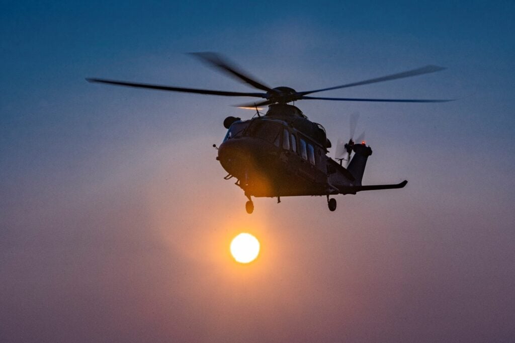 An MH-139A conducts an early morning flight
