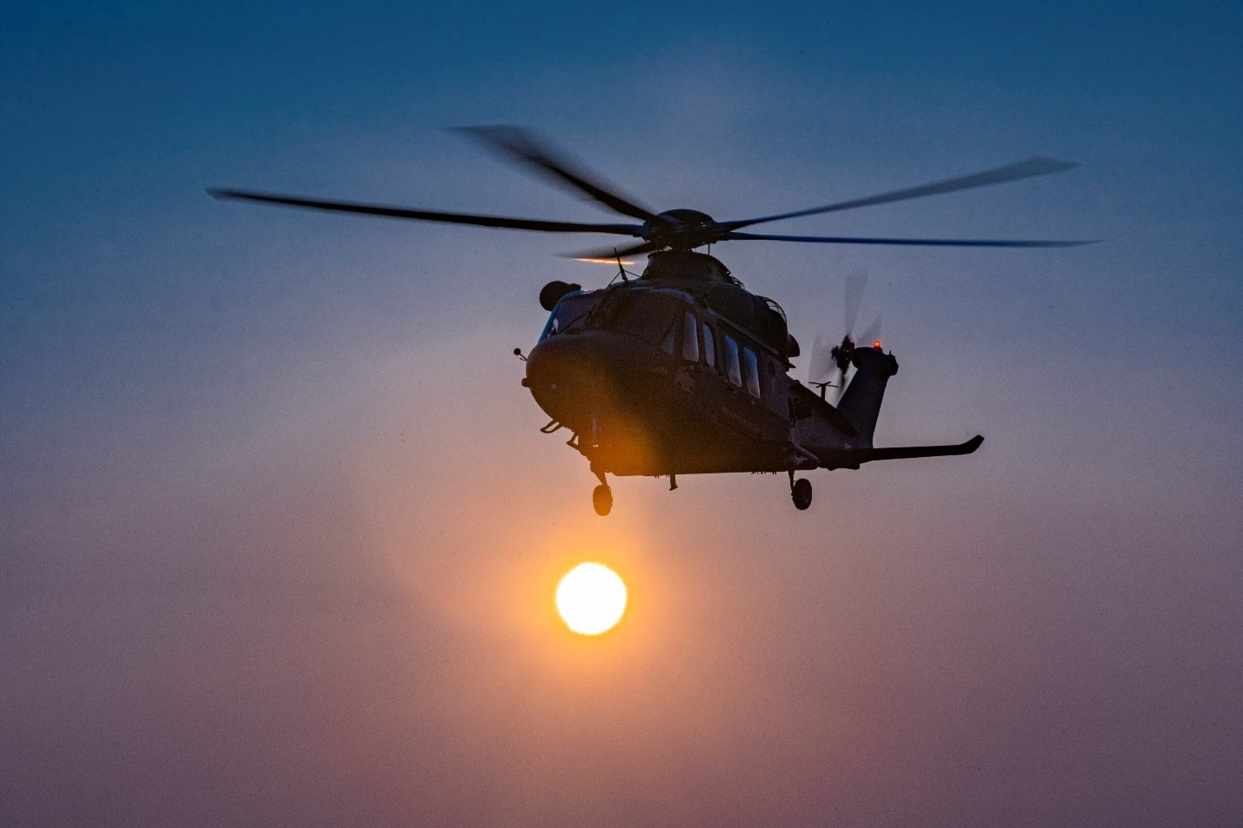 An MH-139A conducts an early morning flight