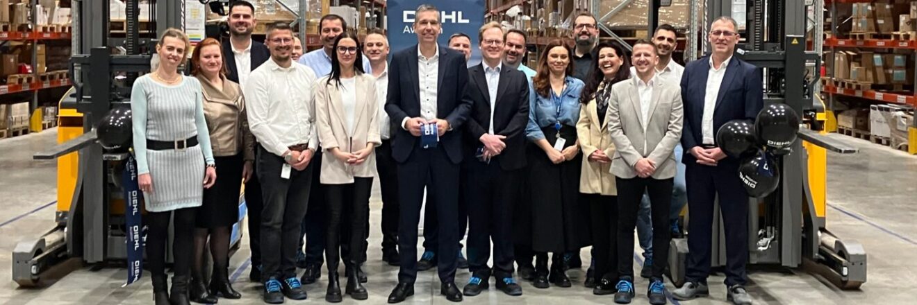 Representatives and employees at the new Hungarian warehouse facility