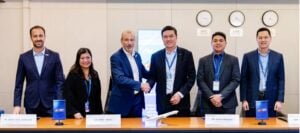 Sealing the deal for GE90 engine support: representatives from Philippine Airlines and AFI KLM E&M