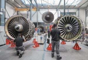 SR Technics employees work on the CFM56 engines