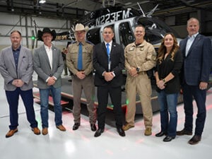 Representatives from DPS and Bell with the new Bell 407GXi helicopter © Bell Textron