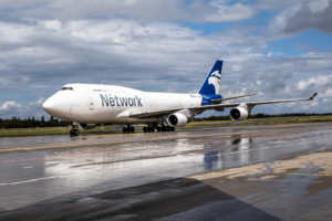 An NAM B747-400BCF aircraft taxiing on the ground in Liege