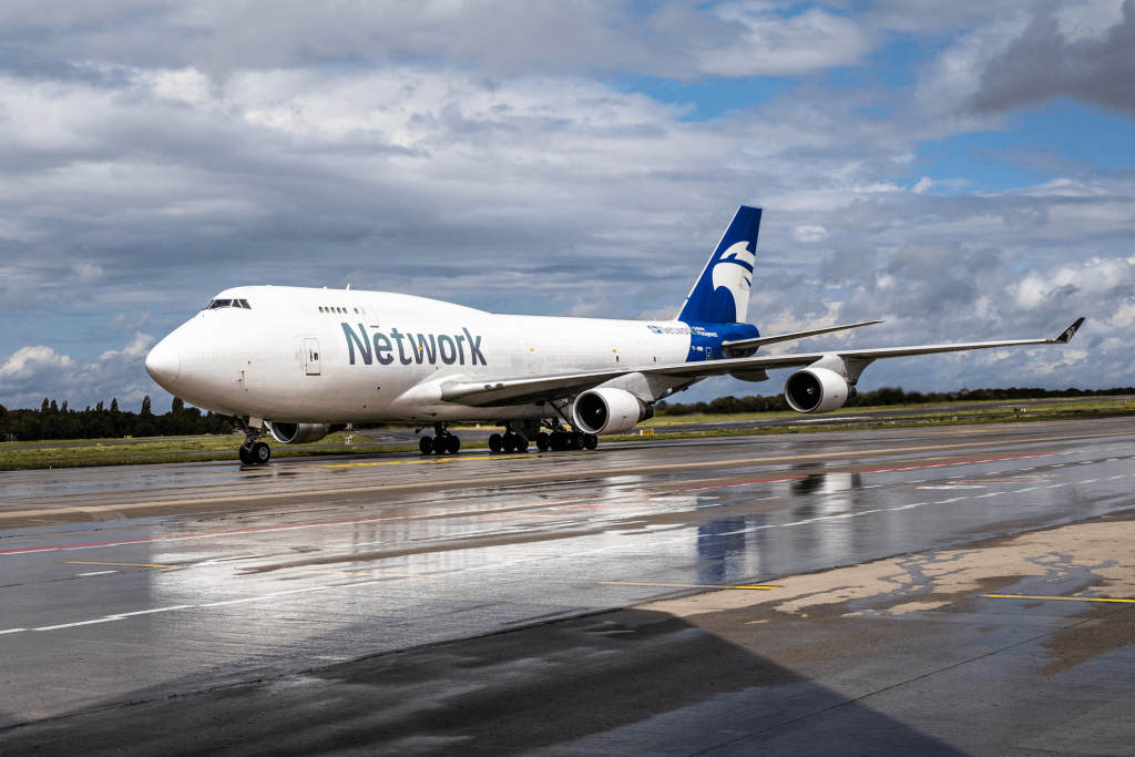 An NAM B747-400BCF aircraft taxiing on the ground in Liege